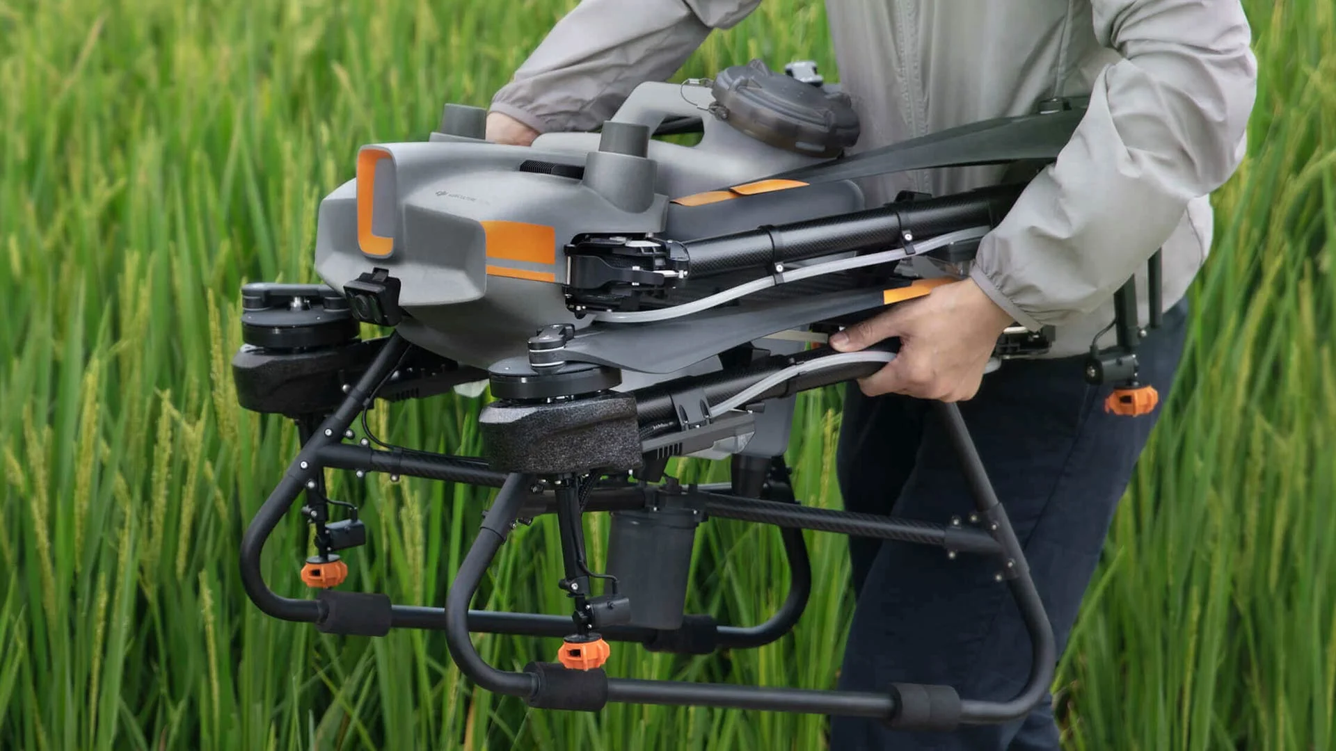 DJI Holding an Agras T30 drone in my hands